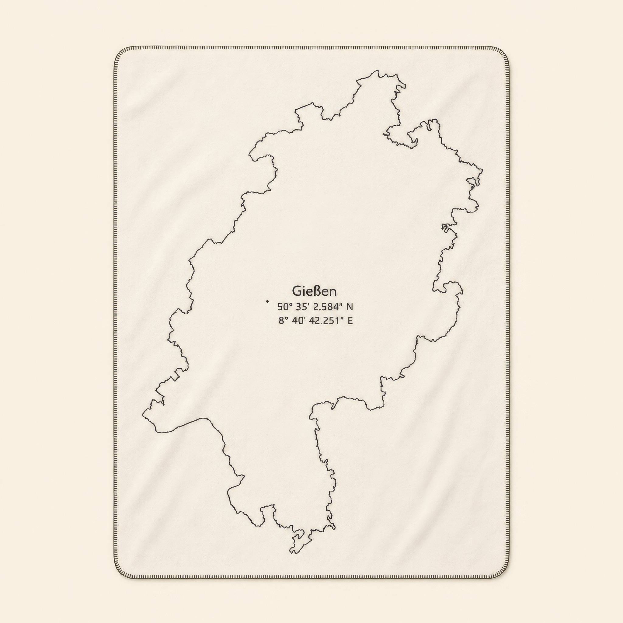 Kolter Decke mit Umriss von Gießen und Koordinaten.